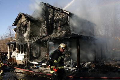 FF's from Northern Westchester knock down Bedford Hills Working Fire. Photo by Frank Beccera. (12/26/08)